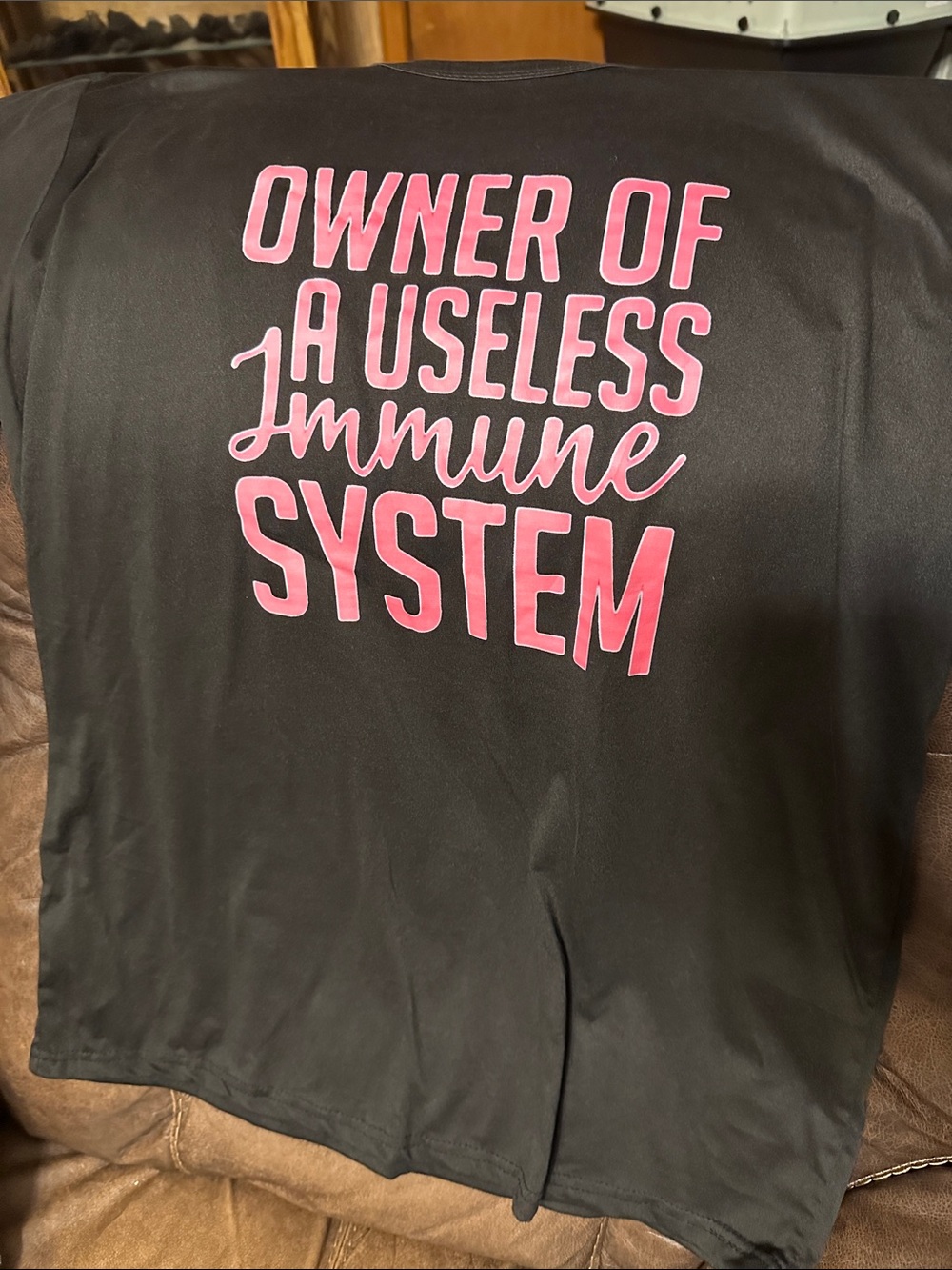 Source Unknown Black Short Sleeve Tee with Pink Slogan